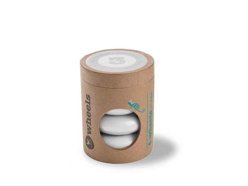 white wheels in cardboard tube