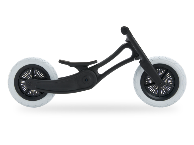 black plastic running bike in low mode